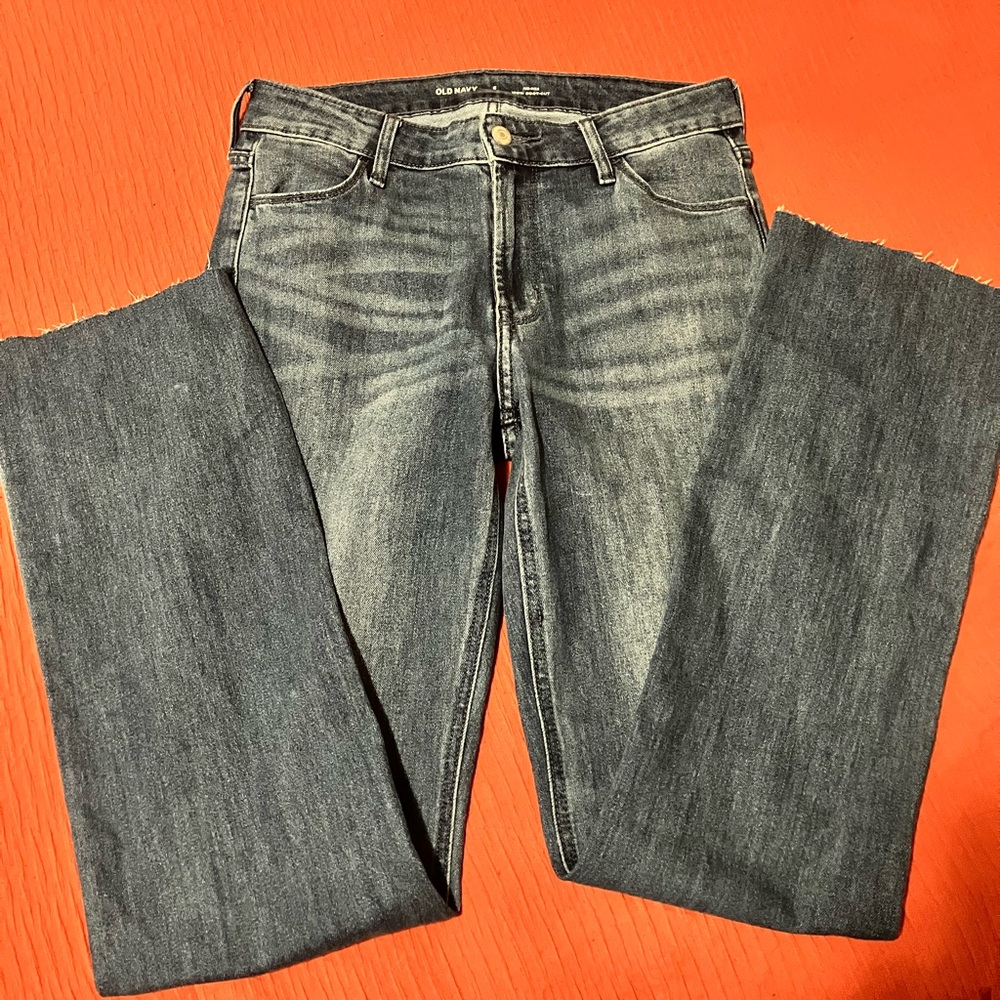 Woman’s old navy jeans raw edge